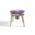 Stool with a purple cushion on a white background